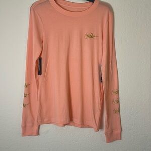 Nike long sleeve standard fit cotton tee in coral pink with gold logo size small